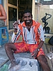 Stone Carver with his marble apple core