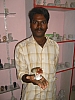 Stone Carver with his marble apple core